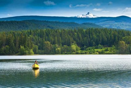 Our Story, paddling a canoe in the North Thompson Valley